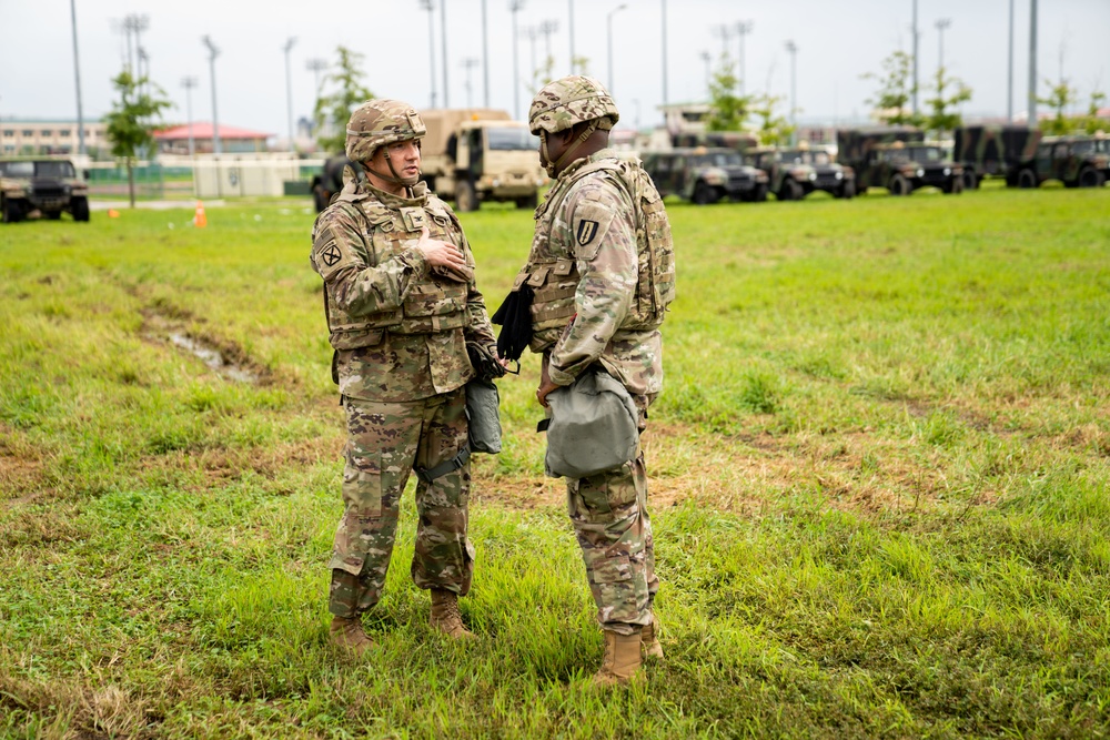 Soldiers conduct signal operations in a field environment