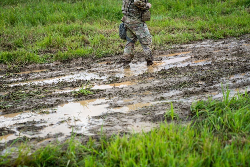 Soldiers conduct signal operations in a field environment