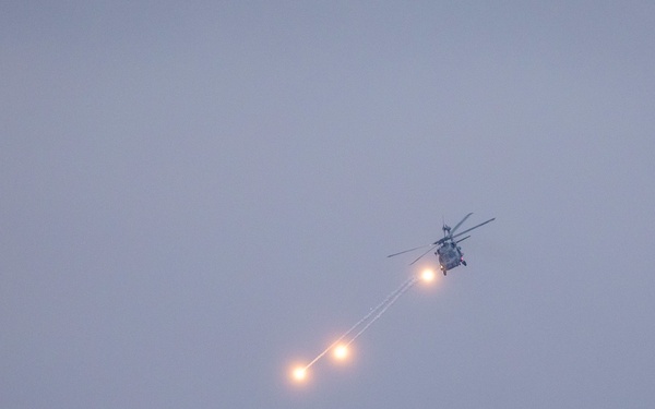 HSM 79, DET 2, MH-60R Helicopter Fires Flares