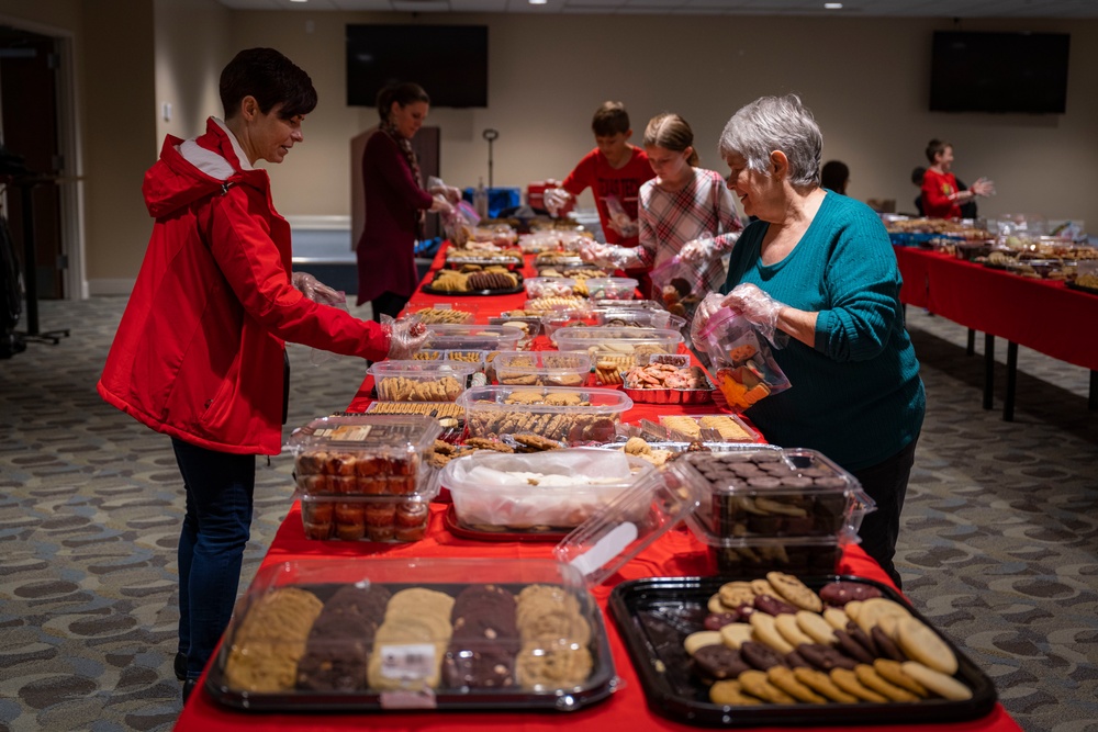 Team Seymour Spouses Club donates cookies to dorm Airmen