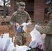 Team Seymour Spouses Club donates cookies to dorm Airmen