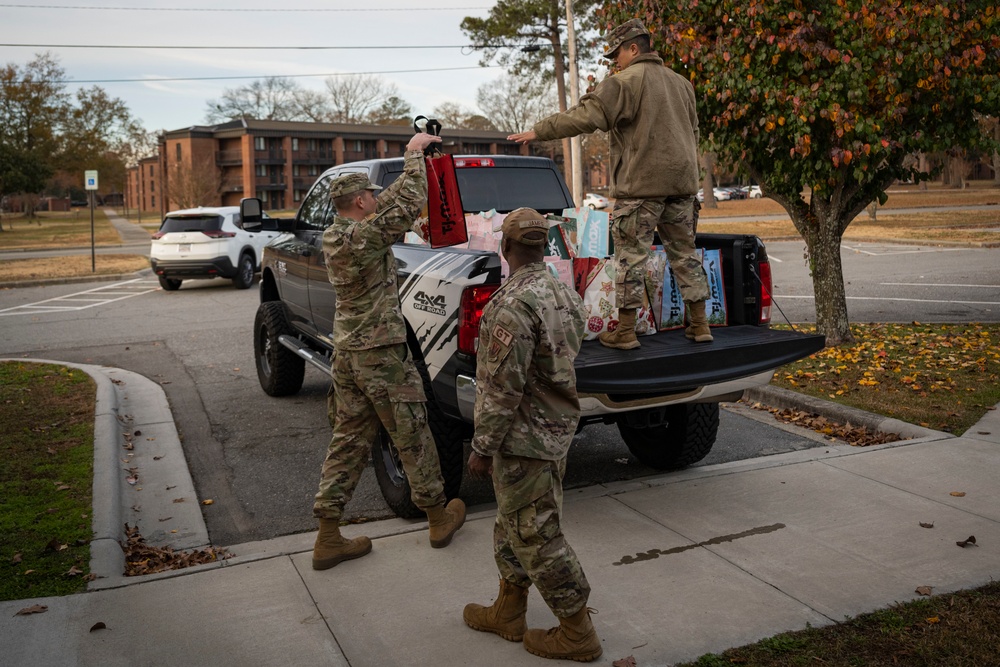 Team Seymour Spouses Club donates cookies to dorm Airmen