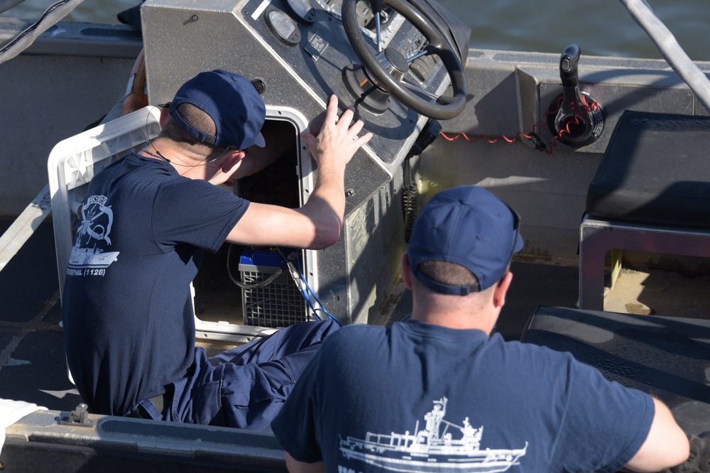 Photo of Work aboard Coast Guard Cutter Hammer
