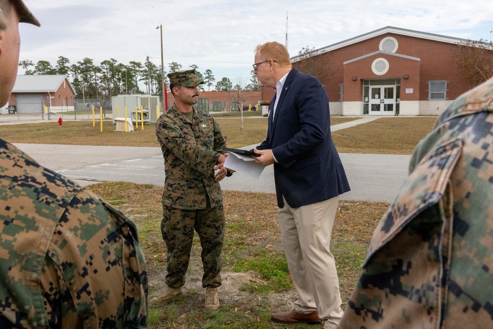 An Explosive Ordnance Disposal Marine receives a Certificate of Excellent Personal Action