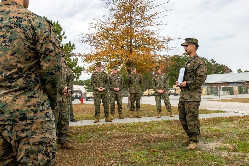 An Explosive Ordnance Disposal Marine receives a Certificate of Excellent Personal Action