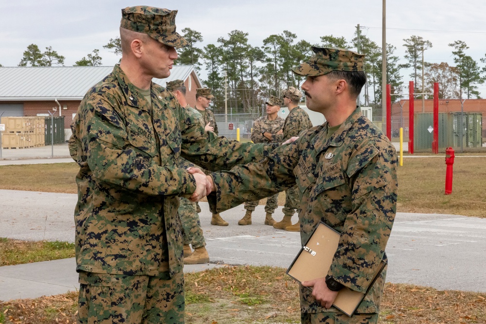 An Explosive Ordnance Disposal Marine receives a Certificate of Excellent Personal Action