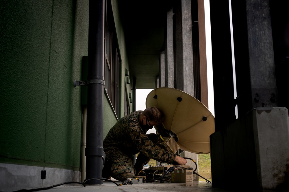 Keen Sword 23: Marines conduct a functions check on the Panther II satellite system