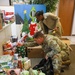 Soldiers from the 3rd Infantry Division help with the Army Community Service Toy Drive