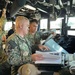 Joint Typhoon Warning Center Sailors Work with QM counterparts Aboard USS Daniel K. Inouye