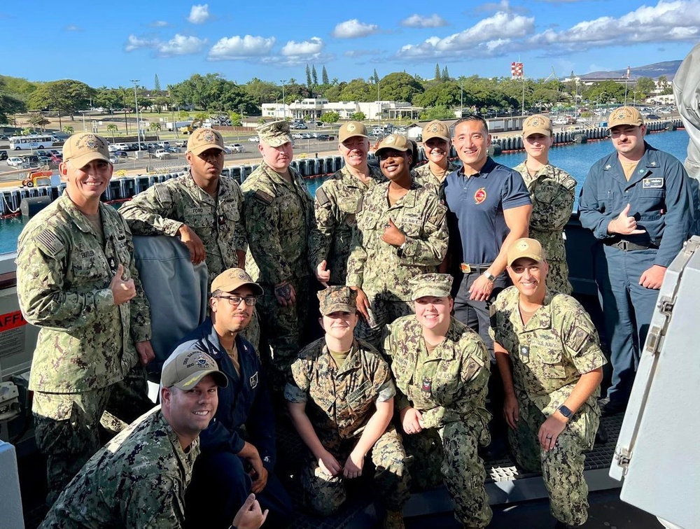 Joint Typhoon Warning Center Sailors Work with QM counterparts Aboard USS Daniel K. Inouye