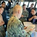 Joint Typhoon Warning Center Sailors Work with QM counterparts Aboard USS Daniel K. Inouye