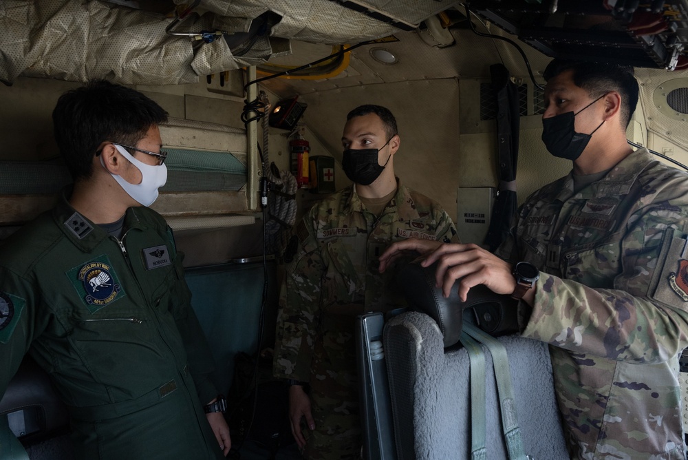 27th Special Operation Wing members receive Japanese Self-Defense Force members at Yokota Air Base, Japan