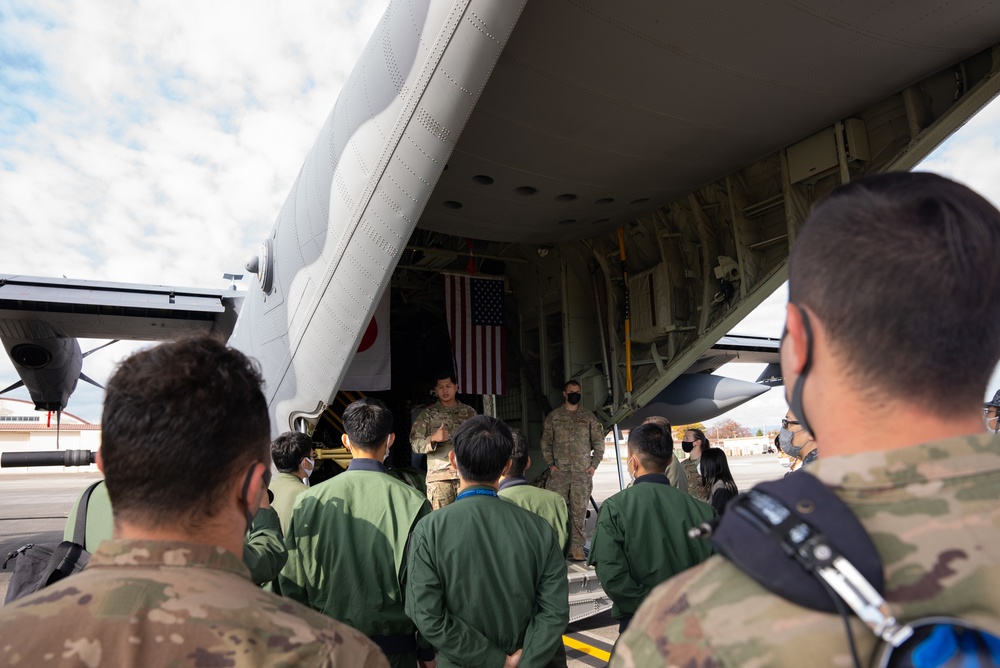 27th Special Operation Wing members receive Japanese Self-Defense Force members at Yokota Air Base, Japan