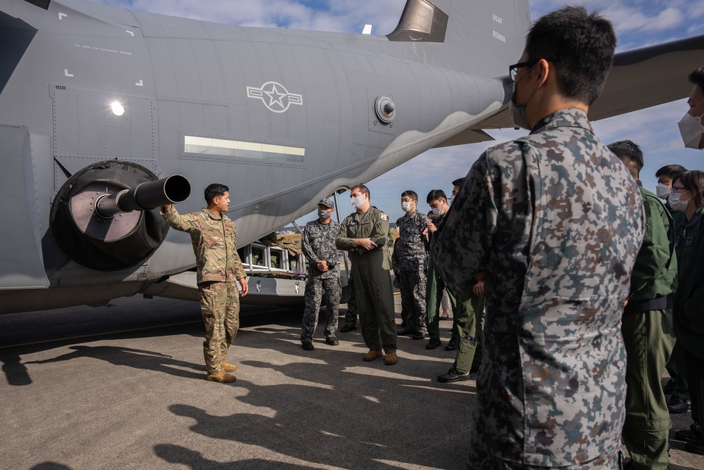 27th Special Operation Wing members receive Japanese Self-Defense Force members at Yokota Air Base, Japan