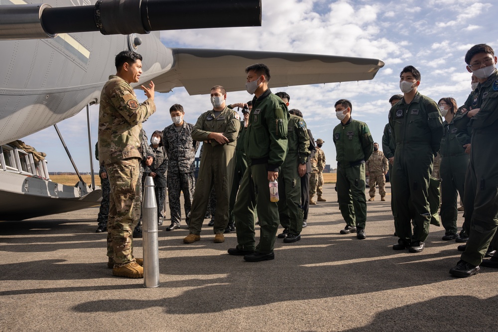 27th Special Operation Wing members receive Japanese Self-Defense Force members at Yokota Air Base, Japan