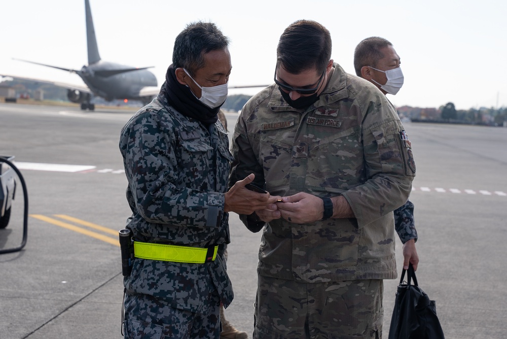 27th Special Operation Wing members receive Japanese Self-Defense Force members at Yokota Air Base, Japan