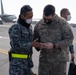 27th Special Operation Wing members receive Japanese Self-Defense Force members at Yokota Air Base, Japan