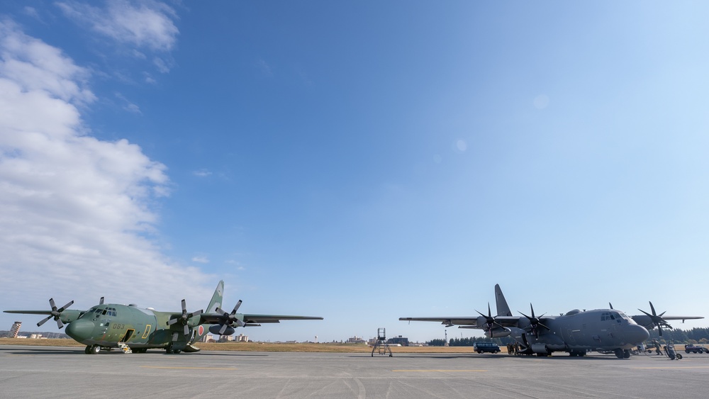 27th Special Operation Wing members receive Japanese Self-Defense Force members at Yokota Air Base, Japan