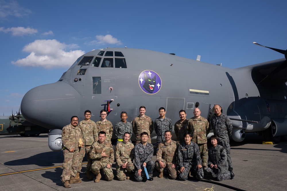 27th Special Operation Wing members receive Japanese Self-Defense Force members at Yokota Air Base, Japan