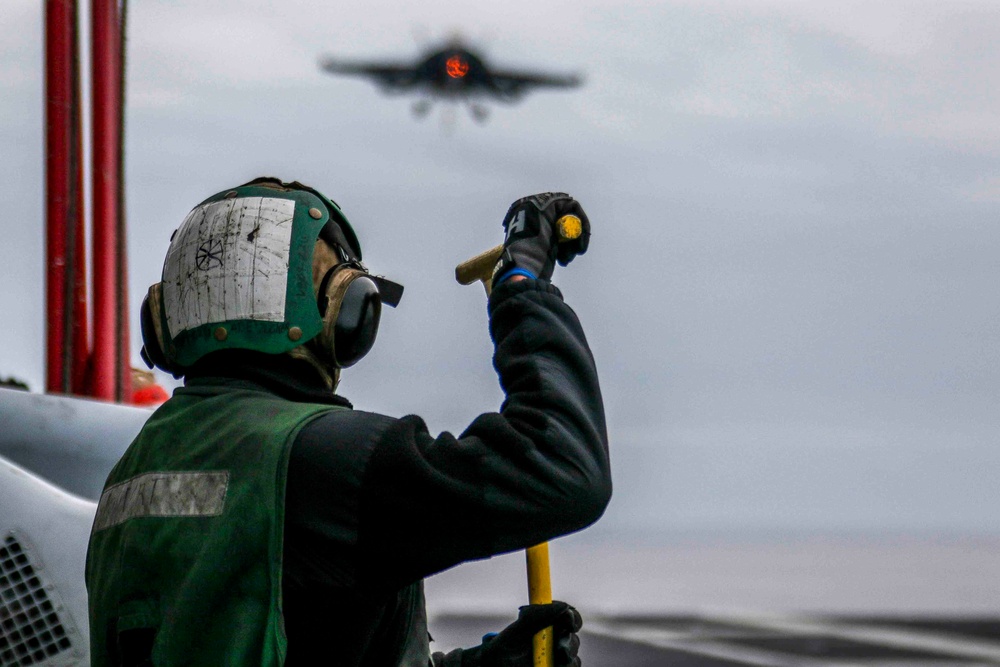 Sailors observes flight operations on the flight deck Abraham Lincoln