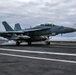 An EA-18G Growler makes an arrested landing on the flight deck Abraham Lincoln