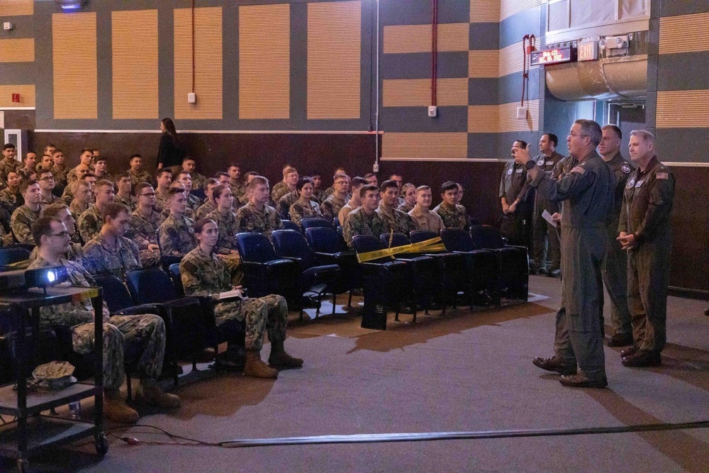 Rear Adm. Pete Garvin, Naval Education and Training Command (NETC), speaks to naval aviation students