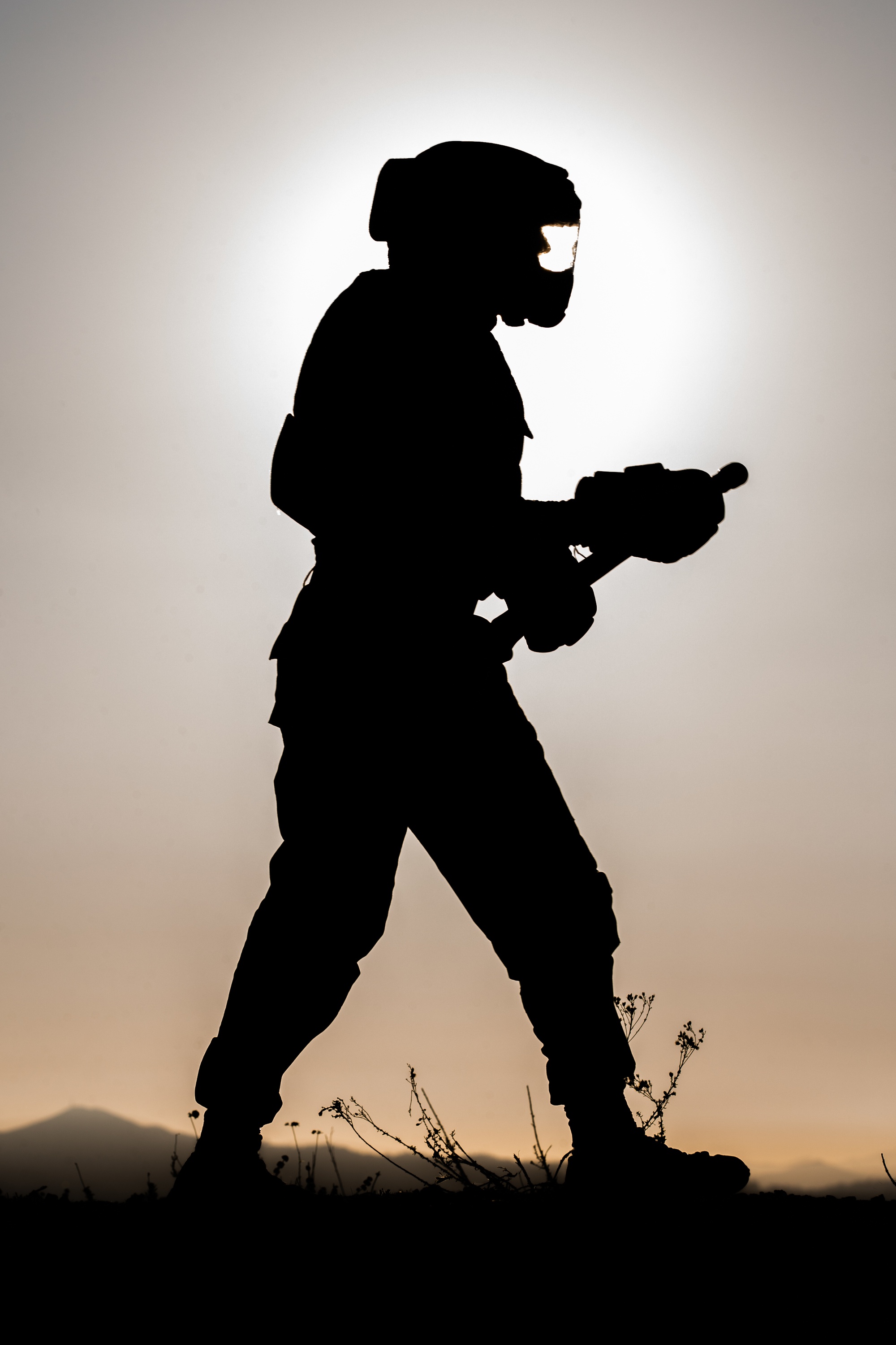 soldier carrying another soldier silhouette