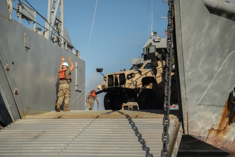 Winter Workhorse 23 | Combat Logistics Battalion 4 Marines load vehicles onto U.S. Army Landing Craft Utility