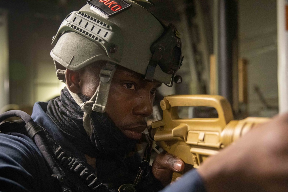 U.S. Navy Sailor participates in VBSS drills on DDG 93