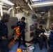 U.S. Navy Sailors take part in engineering and damage control training drills aboard USS Chung-Hoon