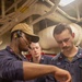 U.S. Navy Sailors take part in engineering and damage control training drills aboard USS Chung-Hoon