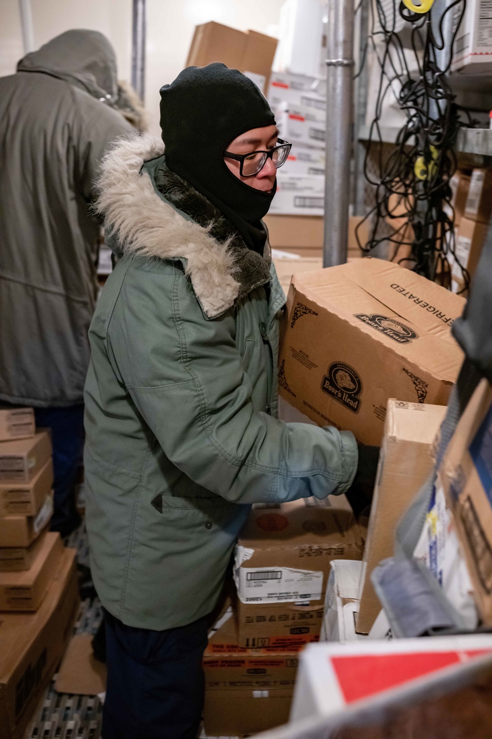 Coast Guard Cutter Polar Star (WAGB 10) culinary specialists conduct inventory