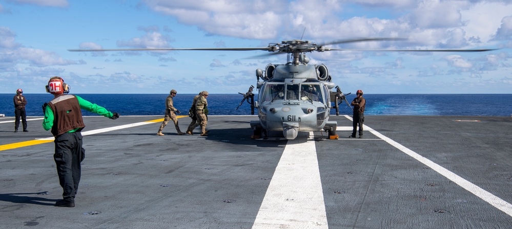 MH-60S Sea Hawk helicopter Rests On The Flight Deck