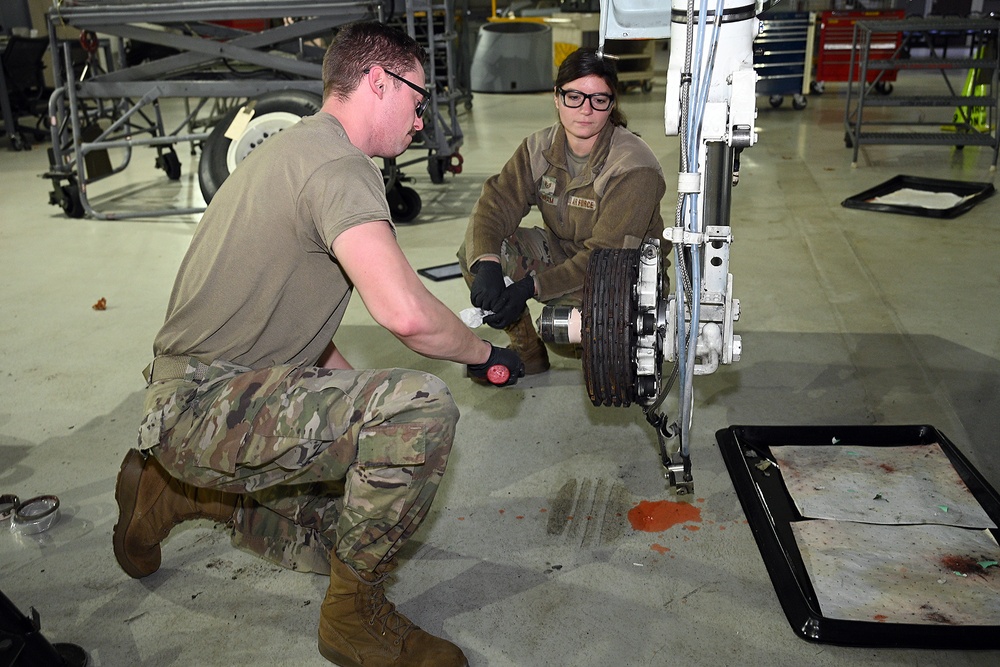 127th Maintenance Squadron repack the brake and wheel assembly strut on an A-10 Thunderbolt II