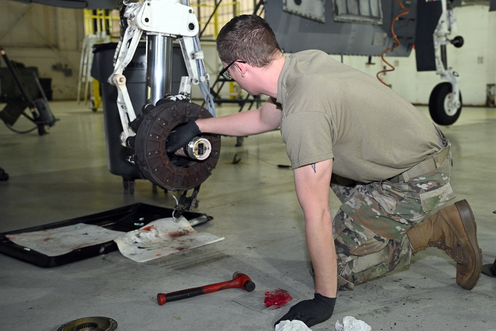 127th Maintenance Squadron repack the brake and wheel assembly strut on an A-10 Thunderbolt II