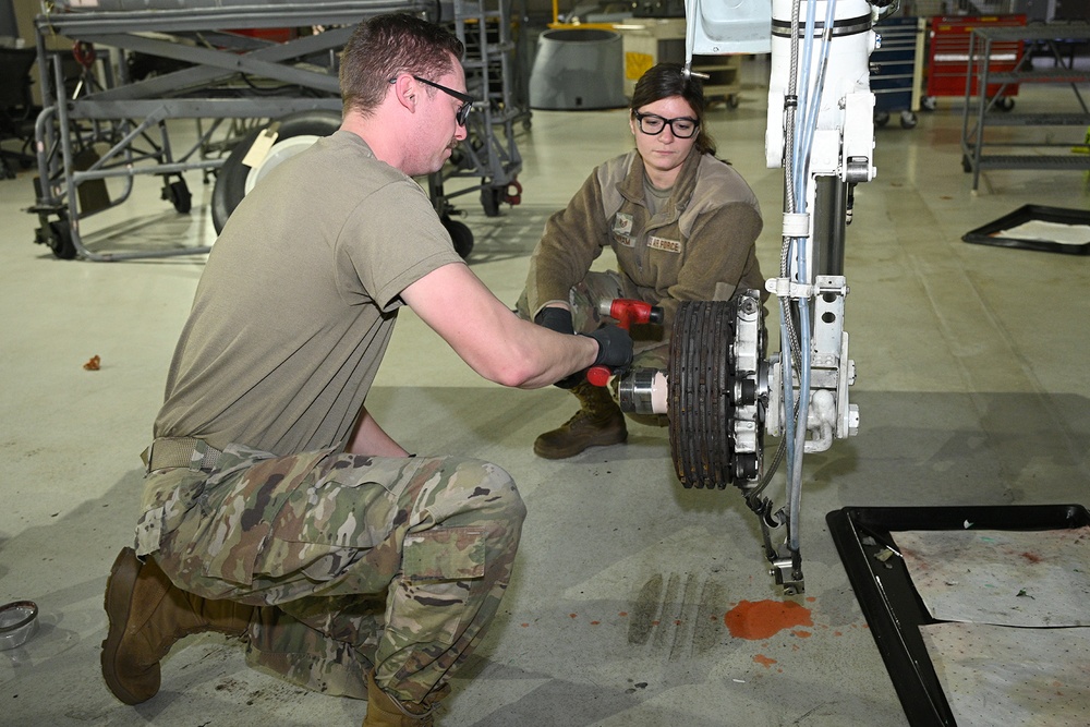 127th Maintenance Squadron repack the brake and wheel assembly strut on an A-10 Thunderbolt II