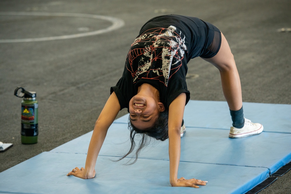 Sailor Takes Part In A Gymnastics Exercise