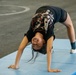 Sailor Takes Part In A Gymnastics Exercise