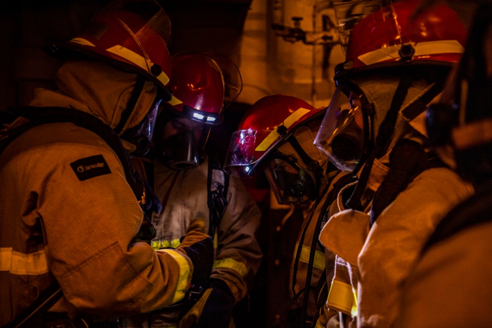 Sailors Participate In A General Quarters Drill