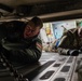 Reserve airmen tie down firetruck aboard C-17