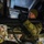Aerial porter ties down firetruck aboard C-17 Aerial porter ties down firetruck aboard C-17