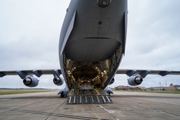 C-17 prepares to close ramp after loading firetruck