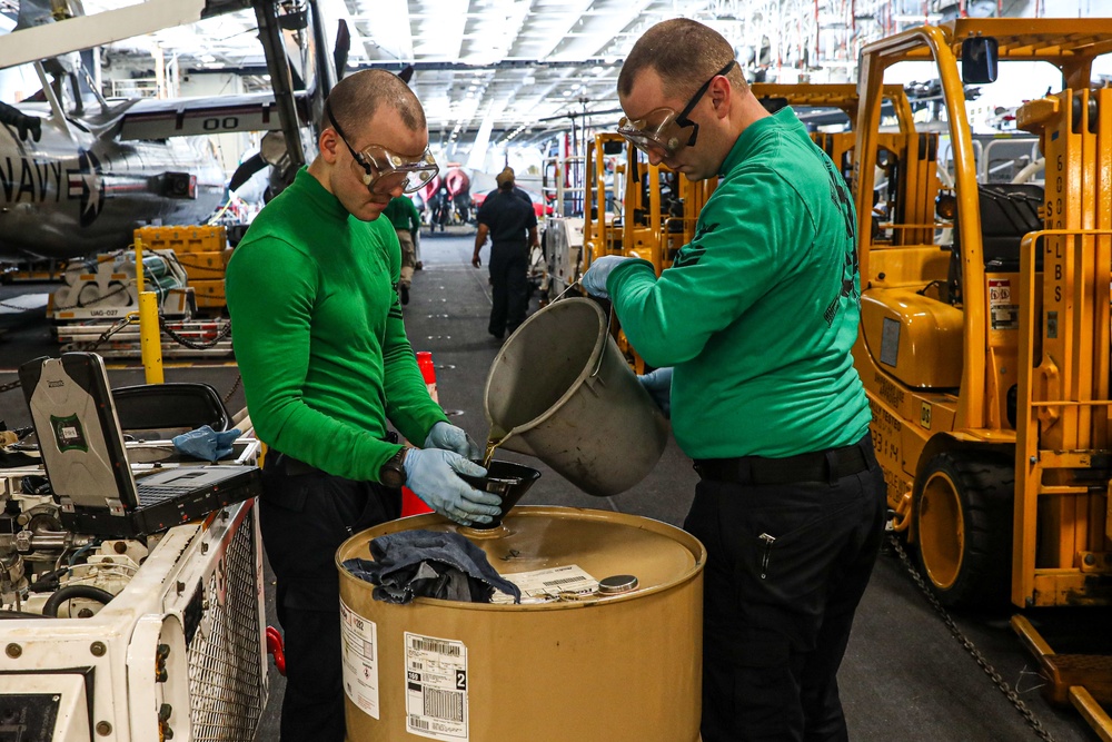 Sailors Discard Hydraulic Fuel