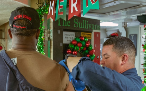 USS The Sullivans administers flu vaccines to crew