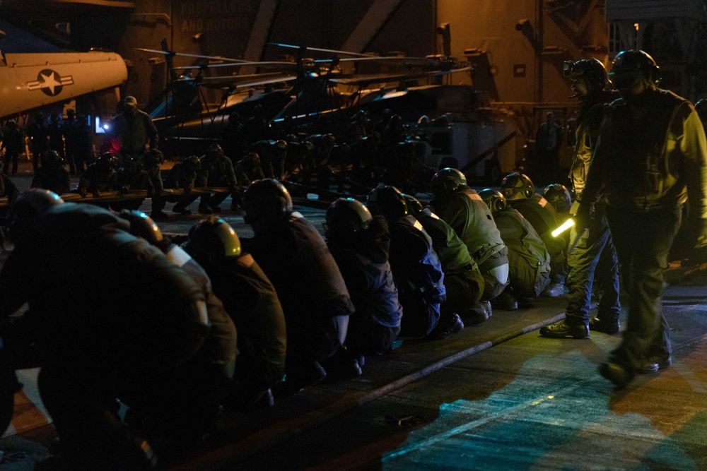 Sailors simulate crash landing response.