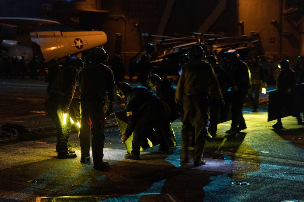 Sailors simulate crash landing response.