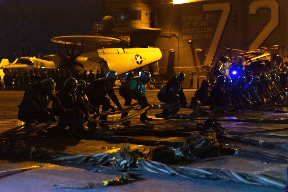 Sailors simulate crash landing response.