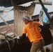 City Officials, Security Force Personnel Clean Up Flooded Zamboanga