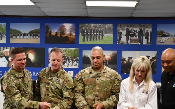 Joint Base Myer-Henderson Hall leadership and representatives with the USO cut the ribbon for the USO game room opening