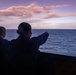 Sailors Observe a Passing Ship